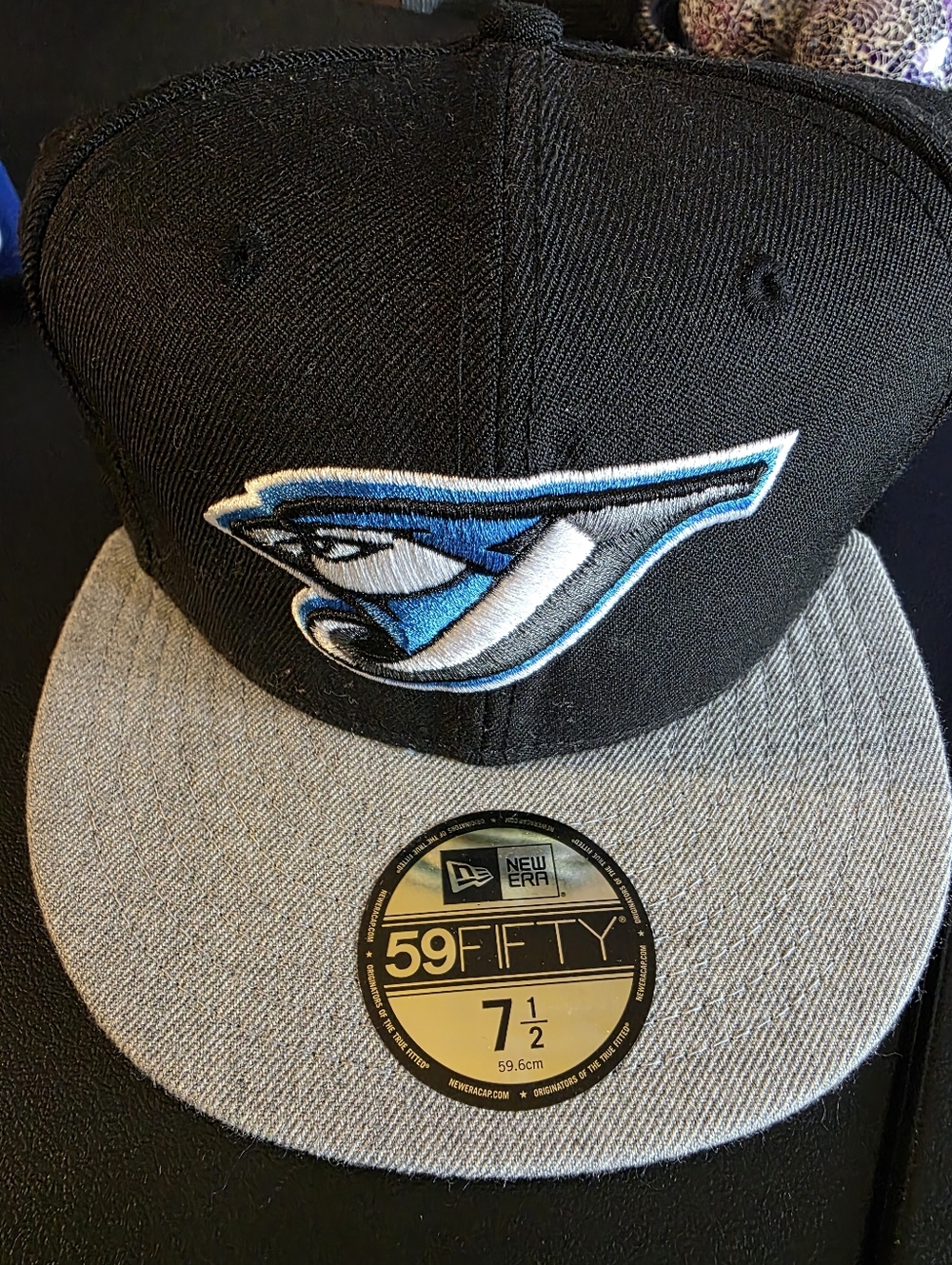 new never been used new era 7 1/2 toronto bluejays hat black & gray
